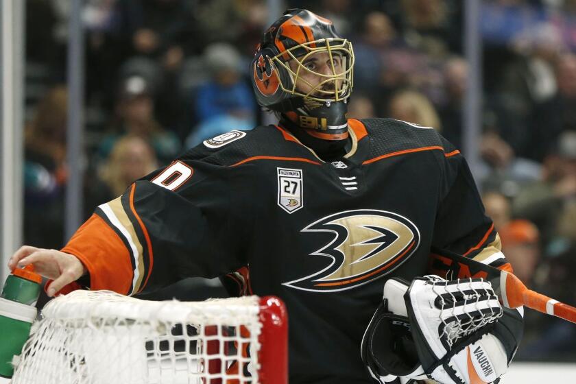 ANAHEIM, CALIFORNIA - FEBRUARY 17: Ryan Miller #30 of the Anaheim Ducks looks up during a break in the second period against the Washington Capitals at Honda Center on February 17, 2019 in Anaheim, California. (Photo by Katharine Lotze/Getty Images) ** OUTS - ELSENT, FPG, CM - OUTS * NM, PH, VA if sourced by CT, LA or MoD **