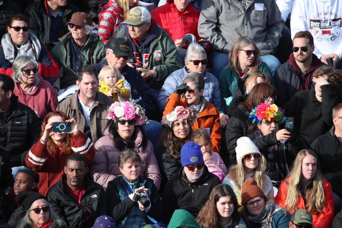 Thousands of parade-goers watch the 2023 Tournament of Roses Parade in Pasadena.