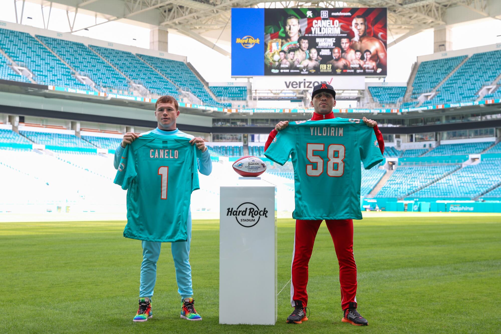 February 22, 2021; Miami FL; Saul "Canelo" Alvarez and Avni Yildirim pose at the Hard Rock Stadium in Miami, FL. 