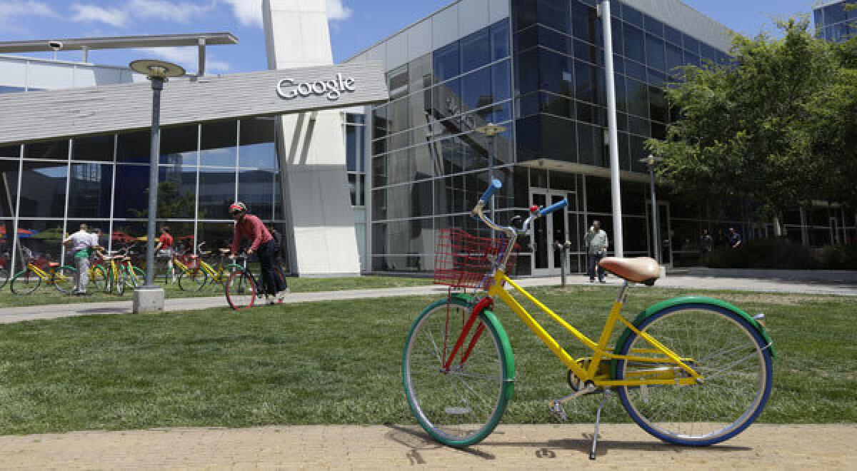 Employees travel around campus via bicycles at Google headquarters in Mountain View, Calif.