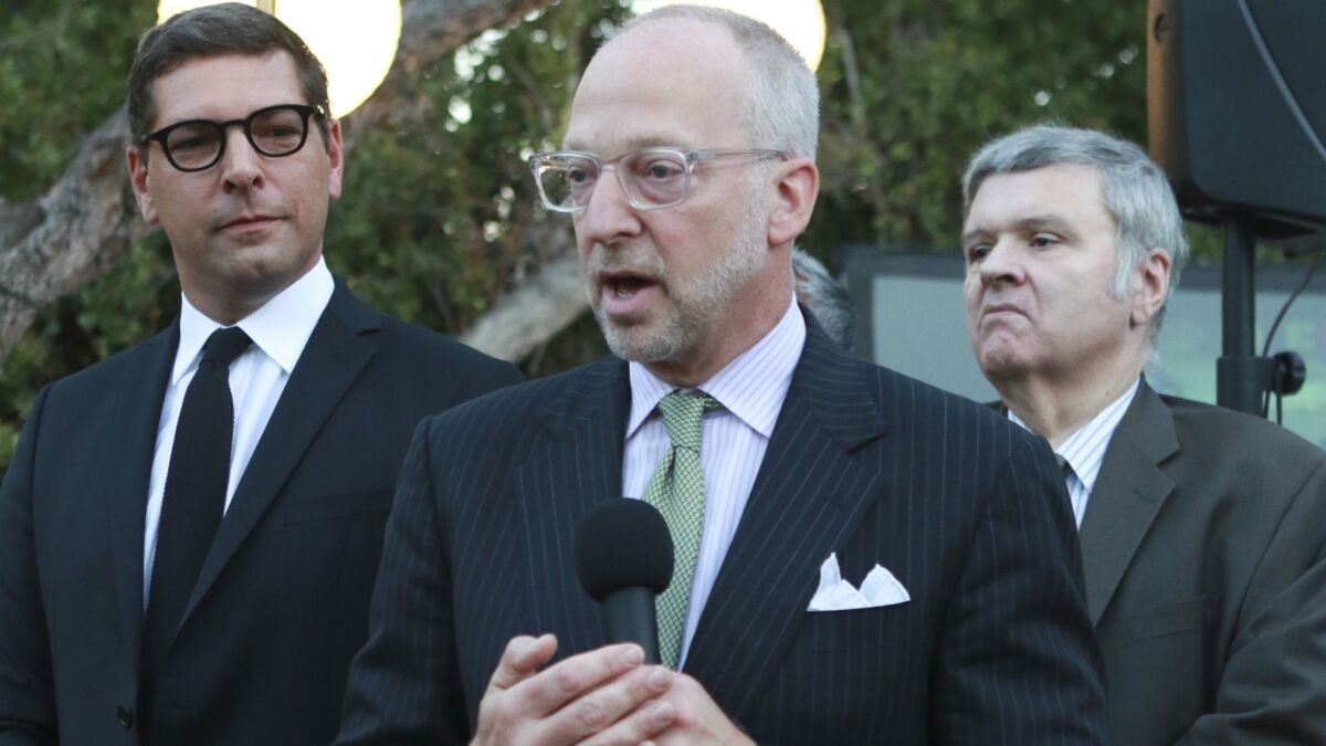 Rick Jacobs, center, shown in 2016, was named in a sexual harassment lawsuit.