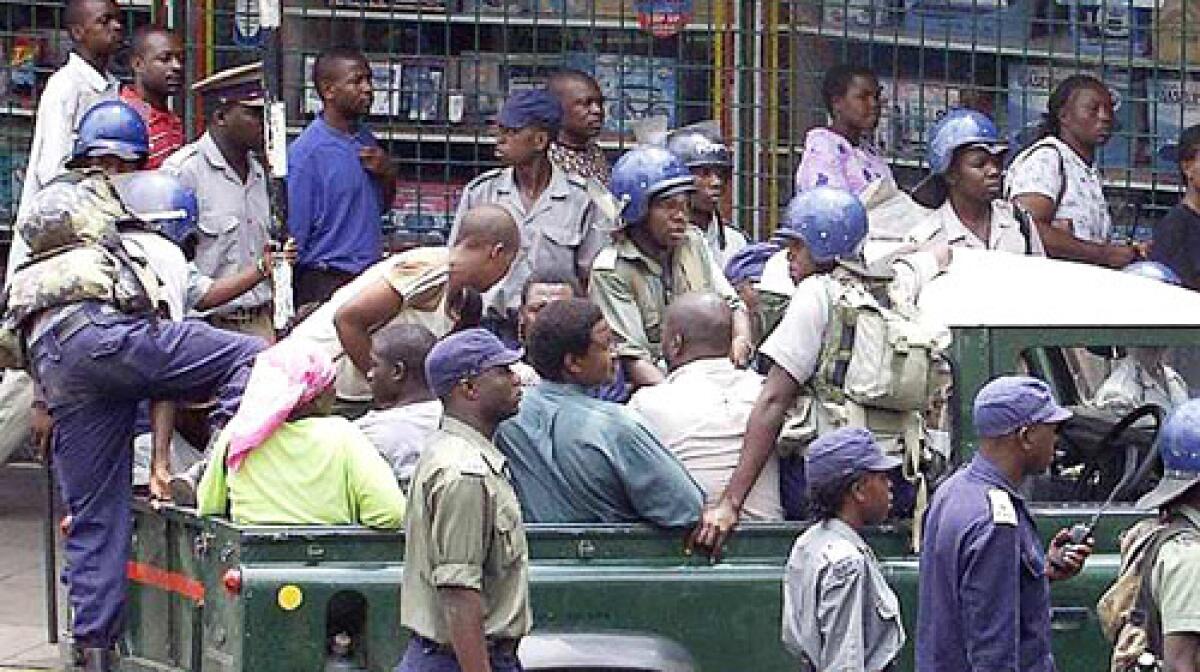 Movement for Democratic Change members bound for a protest against President Robert Mugabe's regime are arrested in Harare, Zimbabwe. Gift Tandare, 41, was slain. Mugabe wants to extend his term. (March 11, 2007)