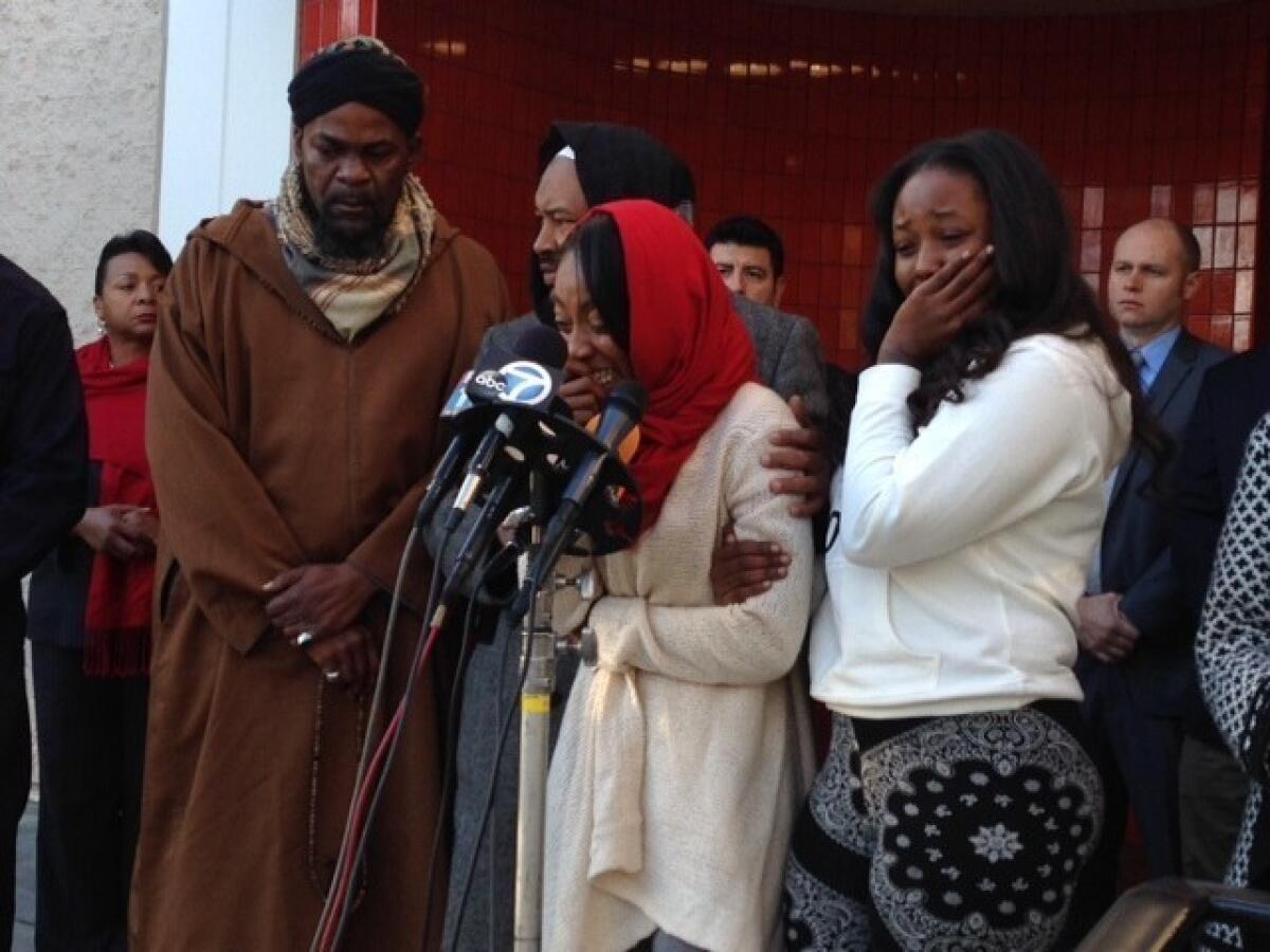 Sawan Mock, dressed in red scarf, begs witnesses to come forward to help solve the killing of her 7-year-old son, Taalib Pecantte.