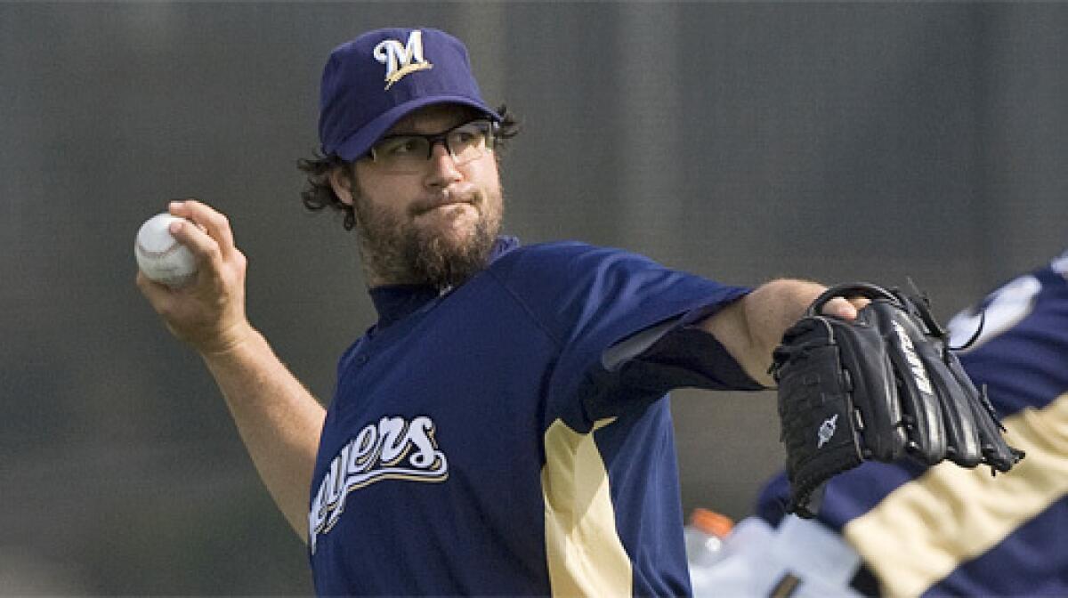 Eric Gagne, who pitched for the Texas Rangers and Boston Red Sox last season, signed a one-year, $10-million free-agent contract with the Milwaukee Brewers two days before the Mitchell Report was released in mid-December.