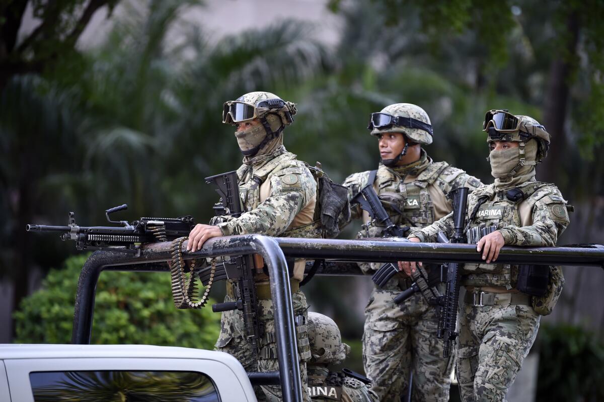 Soldiers patrol in Mexico's Sinaloa state.