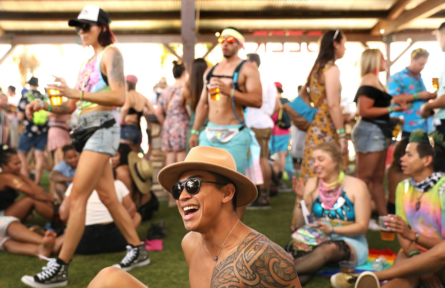 Anthony Tolentino, 23, of Costa Mesa hangs out in the Beer Barn at Coachella.