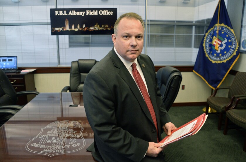 This Wednesday Nov. 28, 2018 photo shows James N. Hendricks, the new special agent-in-charge of the FBI field office headquarters in Albany, NY. Hendricks quietly retired in 2020 as a special agent in charge after the Office of Inspector General — the Justice Department's internal watchdog — concluded he sexually harassed eight female subordinates in one of the FBI’s most egregious known cases of sexual misconduct. (John Carl D'Annibale/The Albany Times Union via AP)