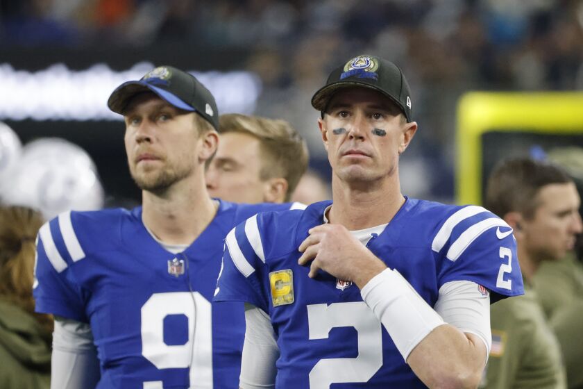 Indianapolis Colts quarterback Matt Ryan (2) watches during the first half of an NFL football game against the Dallas Cowboys, Sunday, Dec. 4, 2022, in Arlington, Texas. (AP Photo/Michael Ainsworth)
