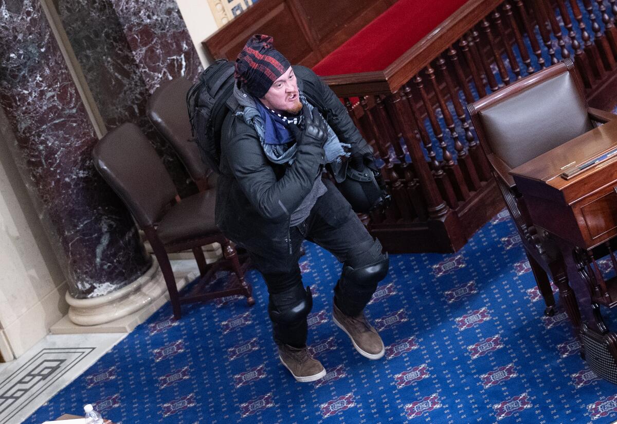 Josiah Colt moves to the floor of the Senate chamber at the U.S. Capitol Building in Washington, DC.