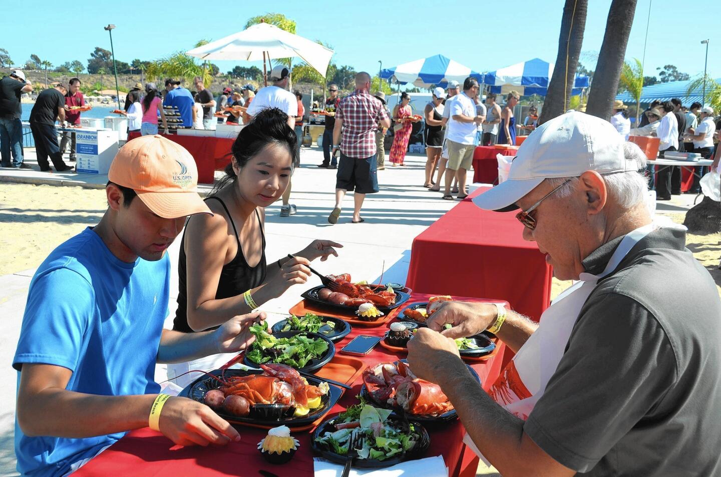 The Kawaguchi family enjoyed their lobster dinner during the seventh annual Lobsterfest held at Newport Dunes on Saturday.