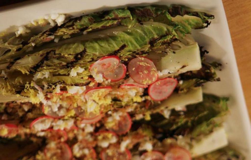 Grilled romaine with radishes, hard-boiled eggs and toasted bread crumbs