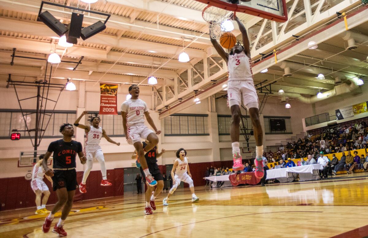 Taft High's Keyon Kensie Jr. dunks against Westchester