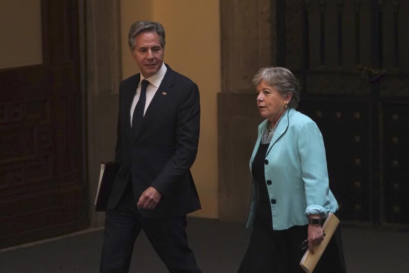 U.S. Secretary of State Antony Blinken, left, and Mexican Secretary of Foreign Affairs Alicia Bárcena walk together during a meeting on security, at the National Palace in Mexico City, Thursday, Oct. 5, 2023. (AP Photo/Marco Ugarte)
