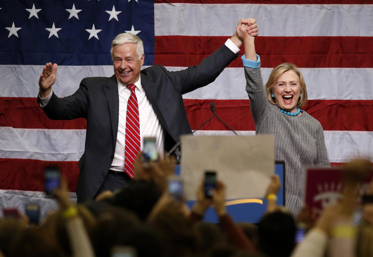 In Maine, Democrat Mike Michaud, shown here with Hillary Rodham Clinton during a recent campaign rally, gained the endorsement Wednesday of U.S. Sen. Angus King, a popular independent, in the state's three-way race for governor.