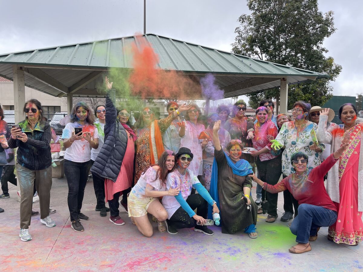 The Good Vibes group at their colorful Holi celebration.