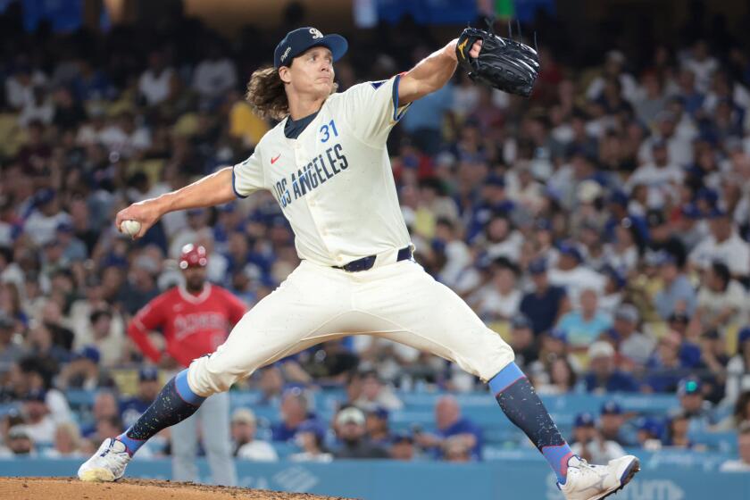 Dodgers pitcher Tyler Glasnow delivers during a game against the Angels in June.