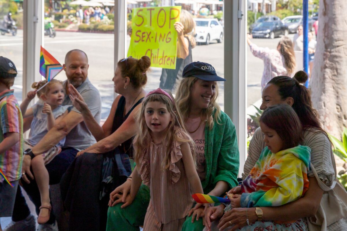 Families wait for Laguna Art Museum's drag story time to start.