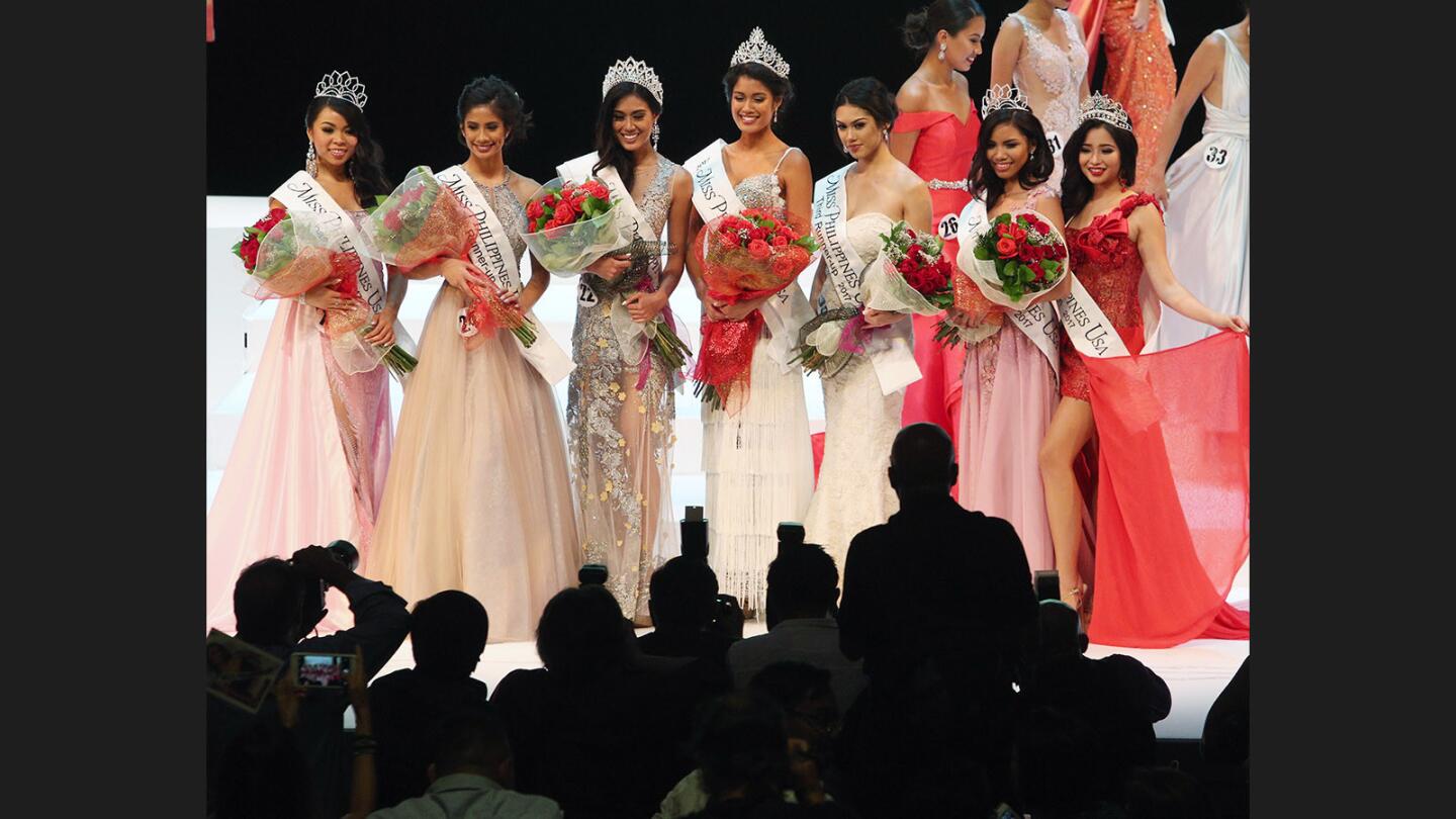 The 2017 Miss Philippines court poses for photos at the 2017 Miss Philippines USA and 2017 Young Miss Philippines USA at the Alex Theatre on Sunday, July 16, 2017. Eleven young women, younger than 18, completed in the Young Miss Philippines USA, and 22 competed for Miss Philippines USA.