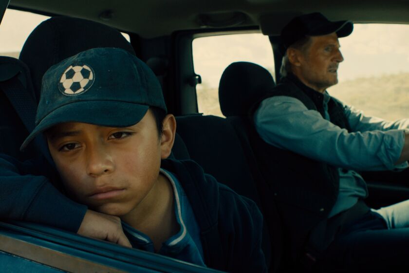 On the road (again) — Jacob Perez and Liam Neeson are fleeing cops and cartel guys in "The Marksman."