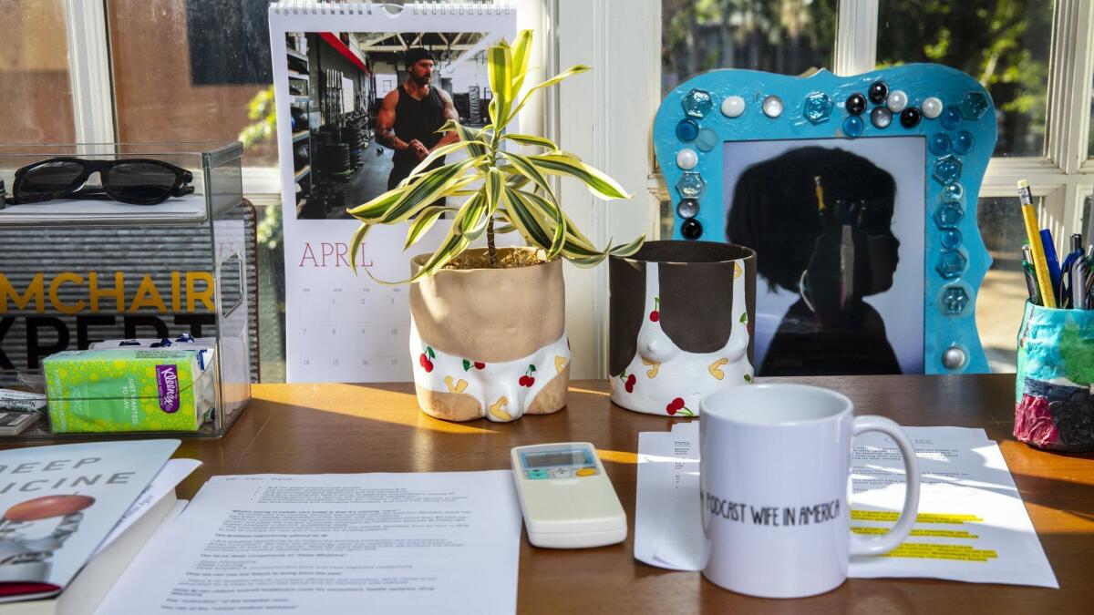 The podcast studio, known as “the attic,” is located above a tiny garage on the grounds of a property where Shepard and Bell are remodeling a home.