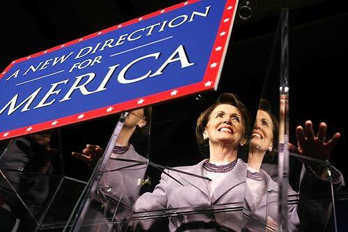 House Democratic party leader Nancy Pelosi (D-CA) is reflected through a plastic podium while addressing supporters at the Hyatt Regency Hotel in Washington, D.C.