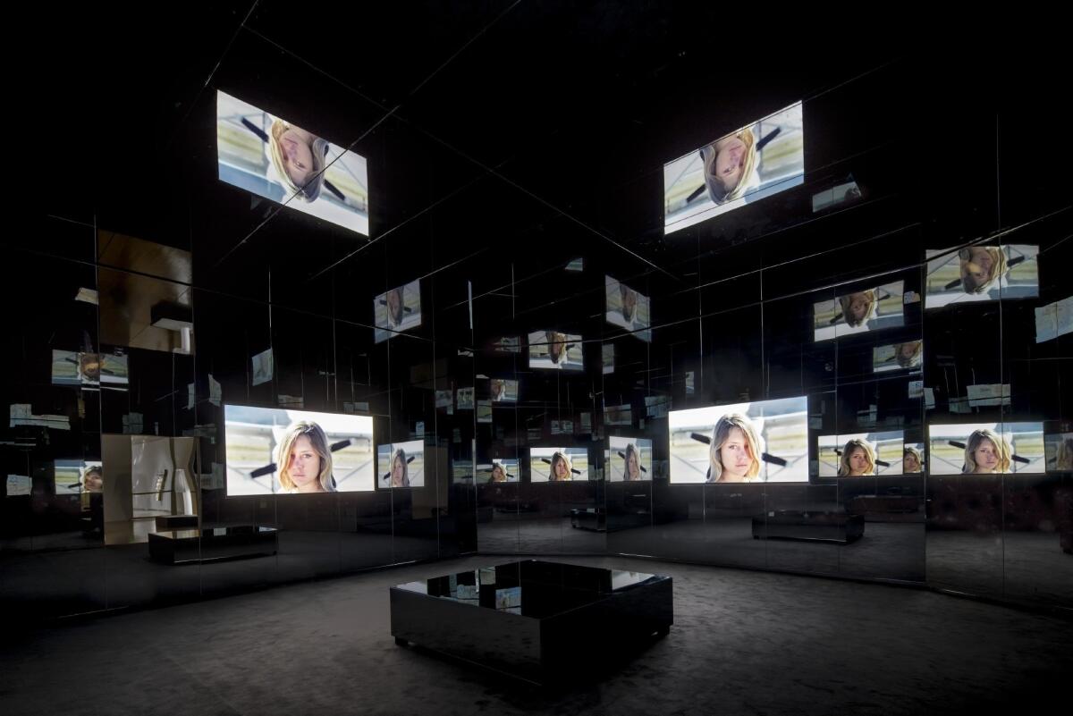 In "Black Mirror," images are reflected in a kaleidoscopic, Cubist-style infinity. (MOCA )