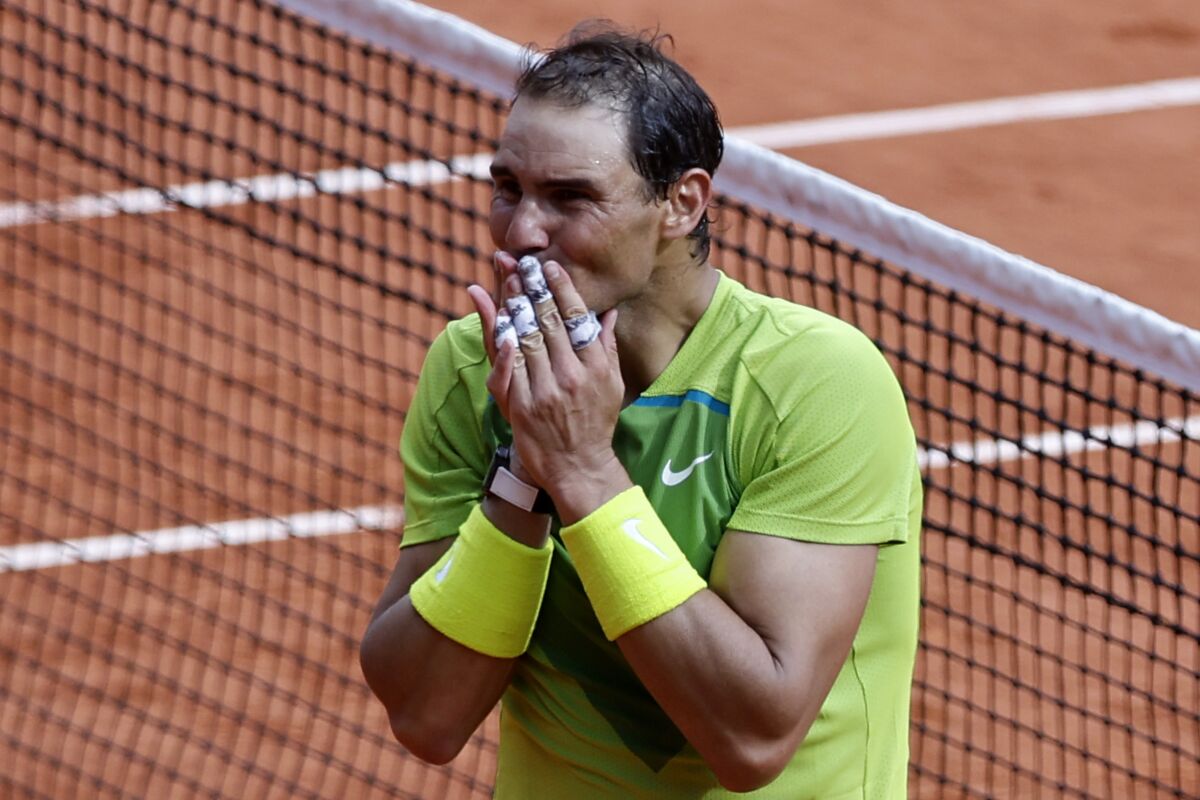 Spain's Rafael Nadal reacts as he defeats Norway's Casper Ruud in their final match of the French Open tennis tournament at the Roland Garros stadium Sunday, June 5, 2022 in Paris. Nadal won 6-3, 6-3, 6-0. (AP Photo/Jean-Francois Badias)