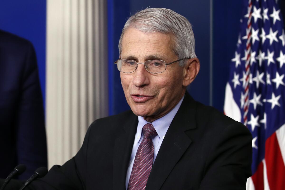 Dr. Anthony Fauci speaks about the coronavirus during a news  briefing at the White House.