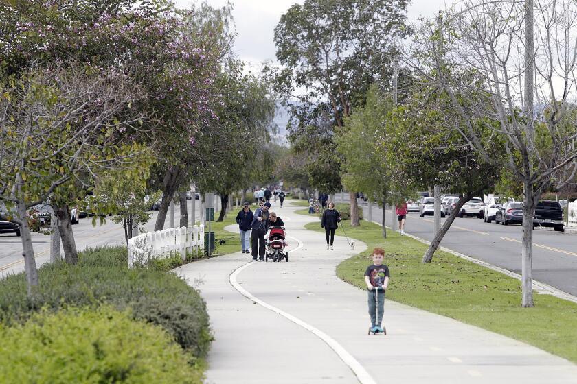 The people are loosely populated on the Chandler Bikeway in Burbank on Tuesday, March 24, 2020. The bikeway is popular for people after gyms, hiking trails, beaches, entertainment venues and more have been recently closed due to coronavirus. People are more than hopeful that this near last location for safe exercise remains open to the public.