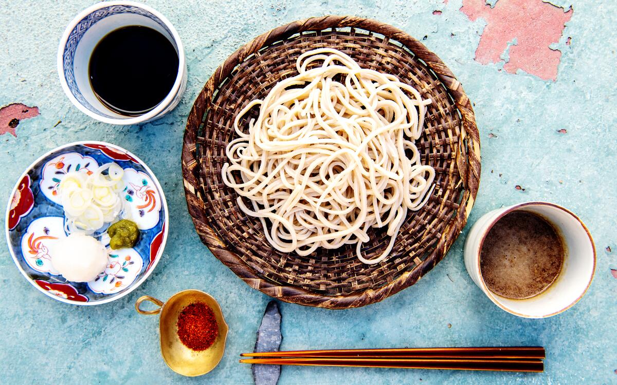 Chilled soba noodles with dipping sauces.