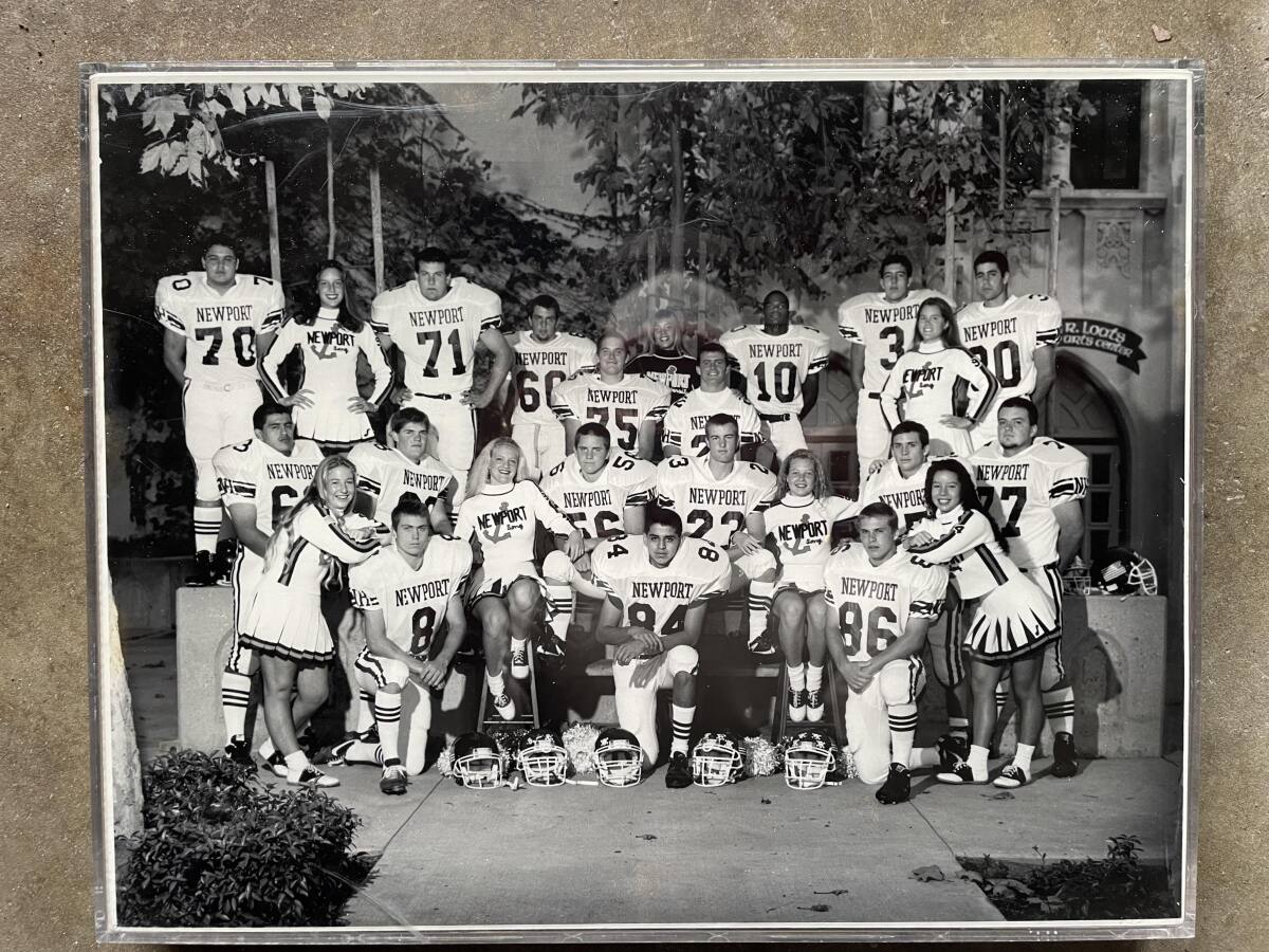 Matt Burns (No. 56, just left of center) played high school football at Newport Harbor before graduating in 1994. 