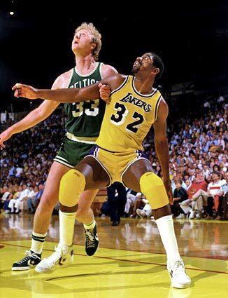 The Lakers Magic Johnson and the Celtics Larry Bird fight for position in the lane during an NBA Finals game at the Forum in 1984. The Celtics won the series, four games to three, to win the title.