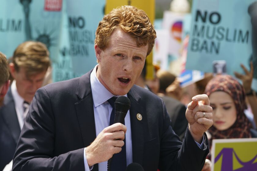 FILE - In this June 26, 2018, file photo, Rep. Joe Kennedy, D-Mass., speaks in front of the Supreme Court in Washington.(AP Photo/Carolyn Kaster, File)
