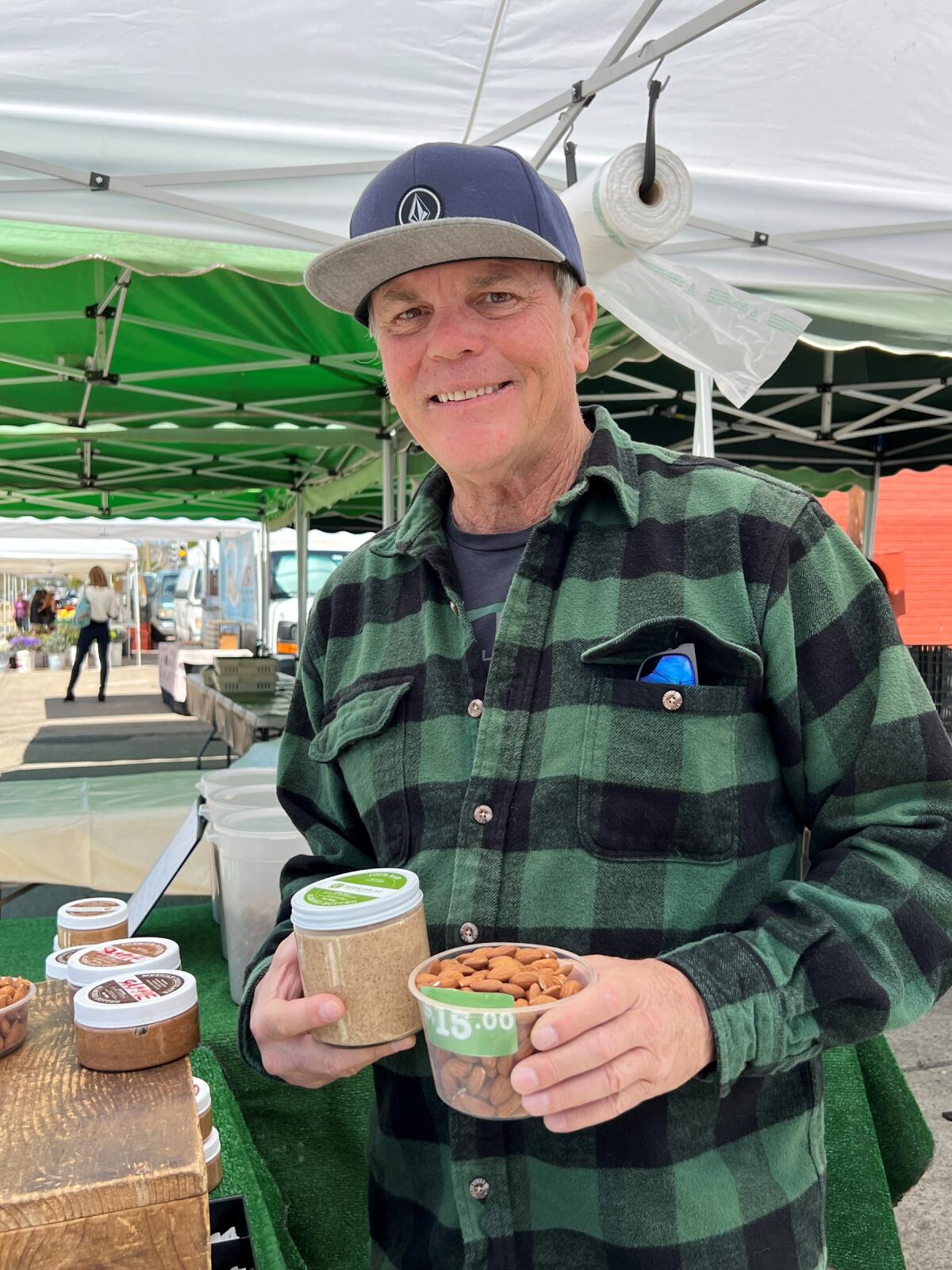 Mark Jackson of Hopkins Almonds showcases some of the almonds and almond butter available.