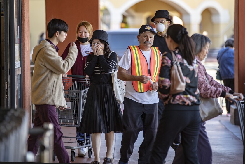 Shoppers wearing masks
