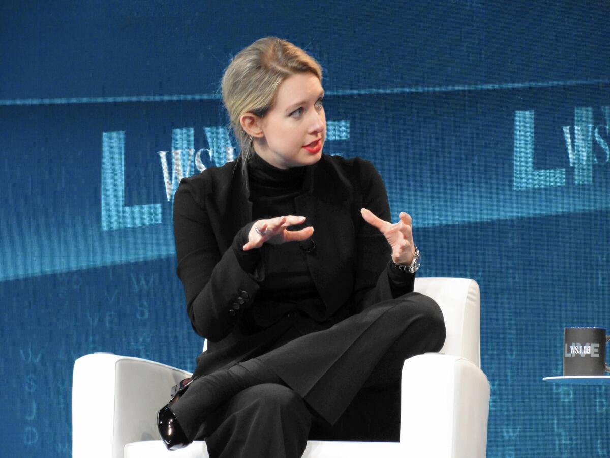 Theranos, valued at $9 billion, is battling a wave of questions about its technology. Above, the start-up’s CEO, Elizabeth Holmes, speaks at a conference.