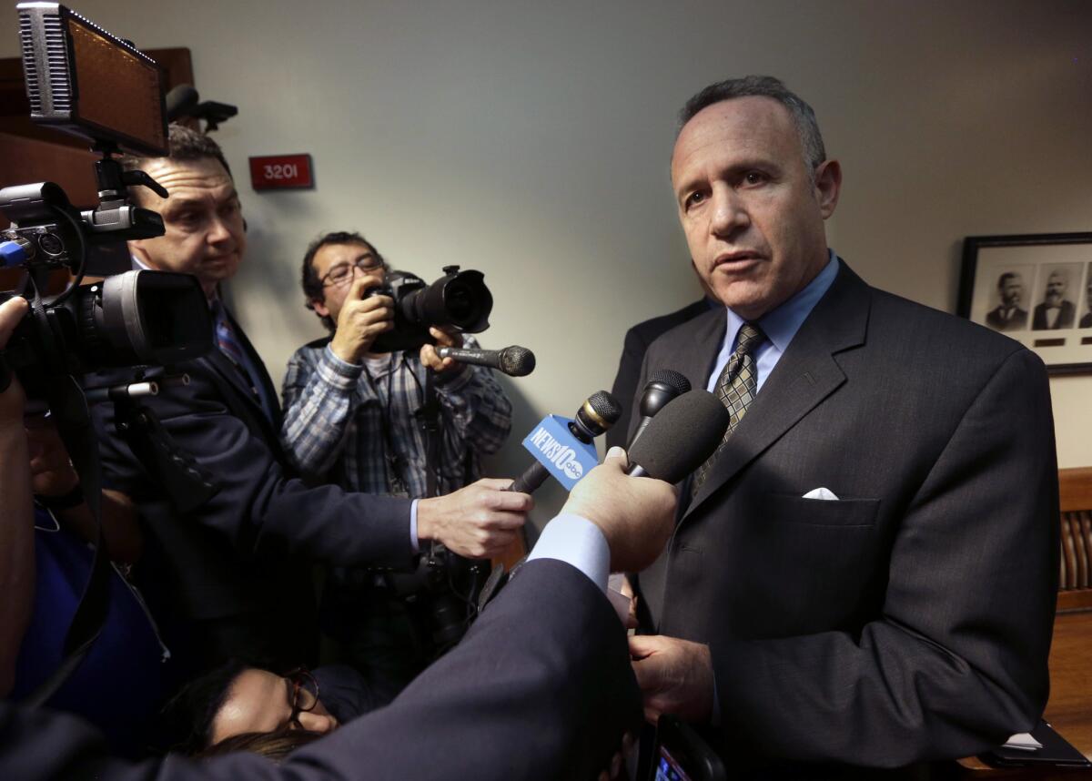 State Senate leader Darrell Steinberg (D-Sacramento) talks with reporters at the Capitol.