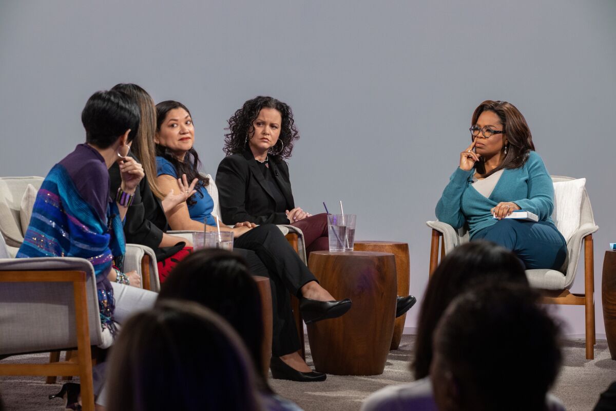 Author Jeanine Cummins (second from right) with Oprah Winfrey, joined by authors (left to right) Esther J. Cepeda, Julissa Arce and Reyna Grande.