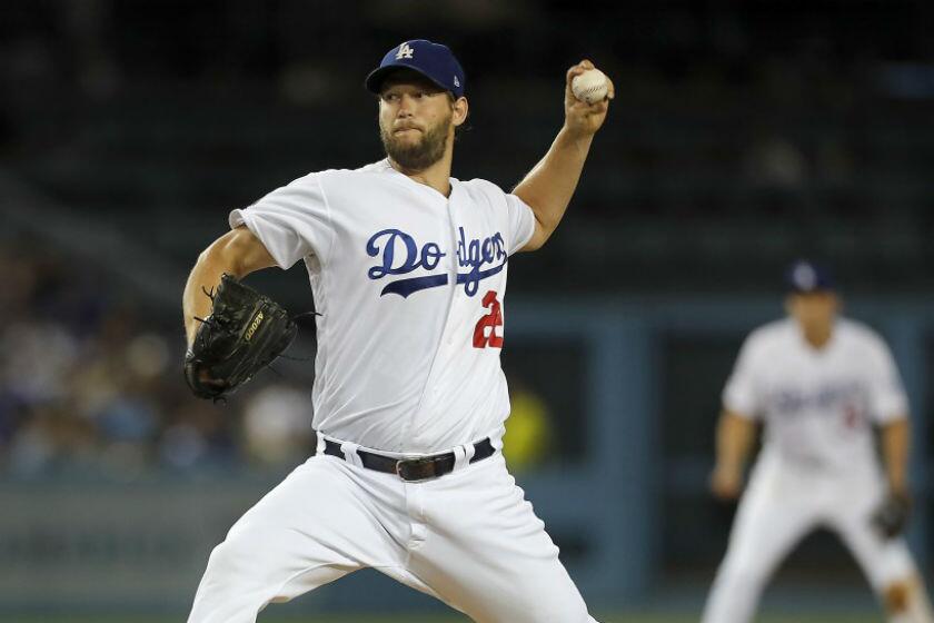 Dodgers ace Clayton Kershaw delivers a pitch against the St. Louis Cardinals.