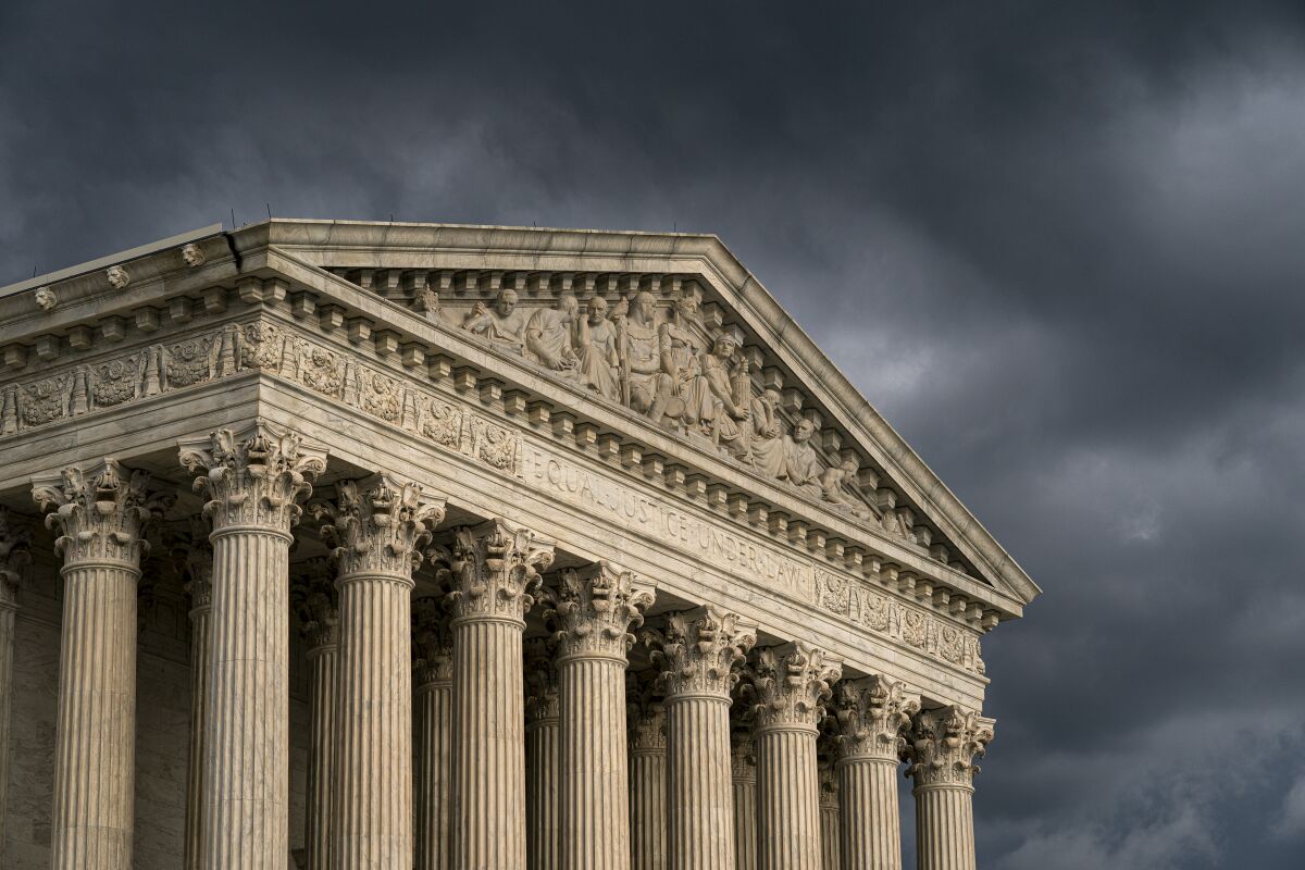 FILE - In this June 20, 2019, file photo, the Supreme Court is seen in Washington as a storm rolls in. On one side of an upcoming Supreme Court case over a proposed natural gas pipeline in New Jersey are two lawyers with more than 250 arguments between them. On the other is Jeremy Feigenbaum, a lawyer for New Jersey who will be making his first Supreme Court appearance.(AP Photo/J. Scott Applewhite, File)