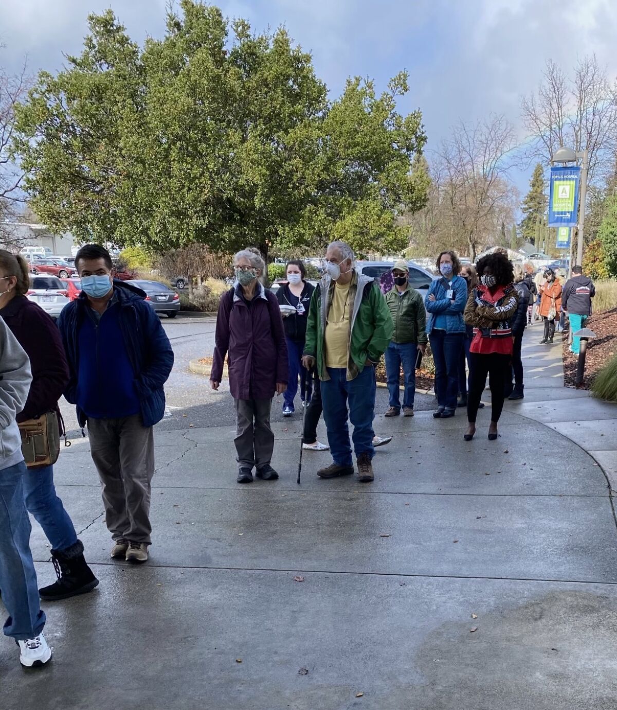 People line up outside Adventist Health Ukiah Valley Medical Center in Mendocino County on Monday for vaccinations.
