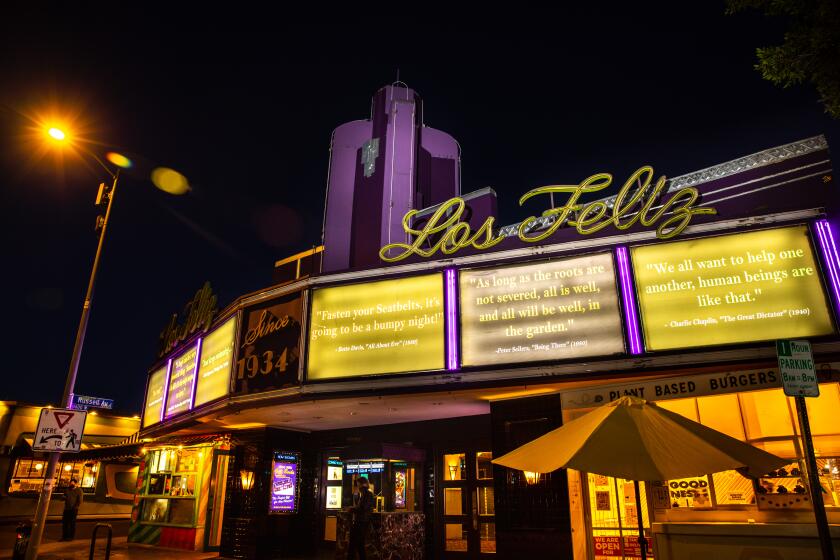 LOS ANGELES, CA - APRIL 21: The Los Feliz Theatre in the heart of Los Feliz Village in Los Angeles, CA, is closed, but has a collection of inspiring quotes on its marquee, during the coronavirus pandemic, photographed Tuesday, April 21, 2020. (Jay L. Clendenin / Los Angeles Times)