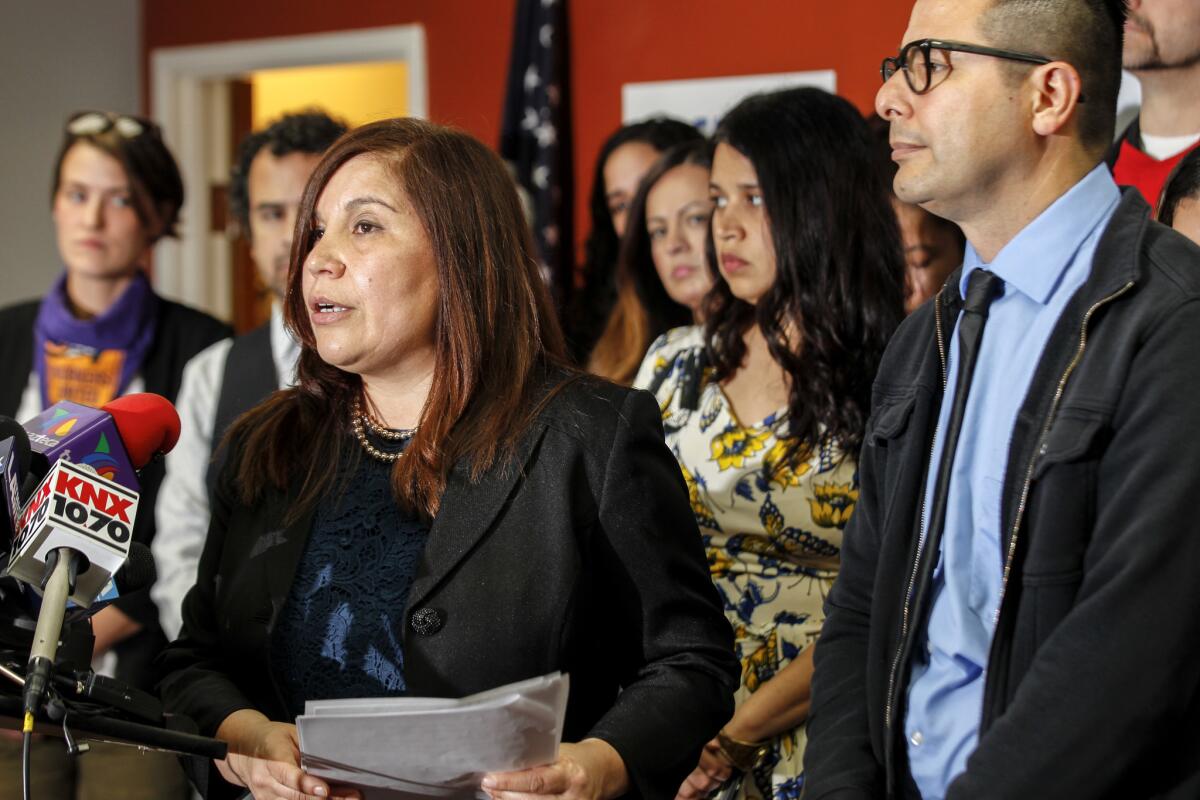 Executive Director Angelica Salas addresses a news conference held by the Coalition for Humane Immigrant Rights of Los Angeles about ICE sweeps.