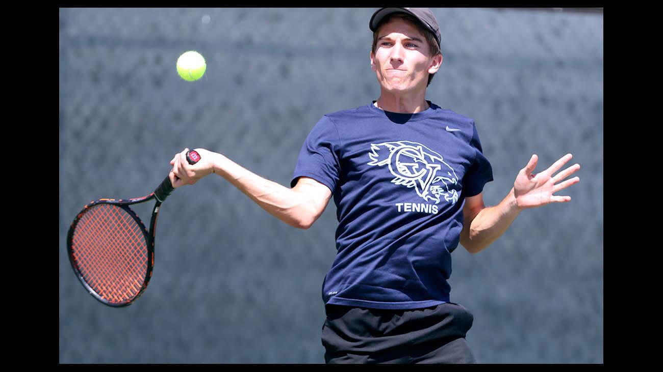 Crescenta Valley High tennis player Kevin Rowe returns the ball in first round of CIF playoffs vs. West Torrance High, at home in La Crescenta on Tuesday, May 9, 2018.