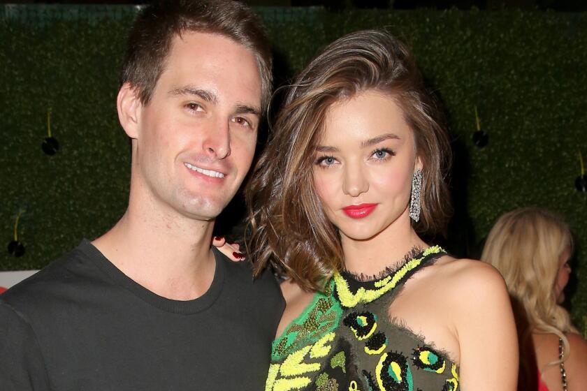 Snapchat's Evan Spiegel and model Miranda Kerr at a Grammys pre-party in February 2016.