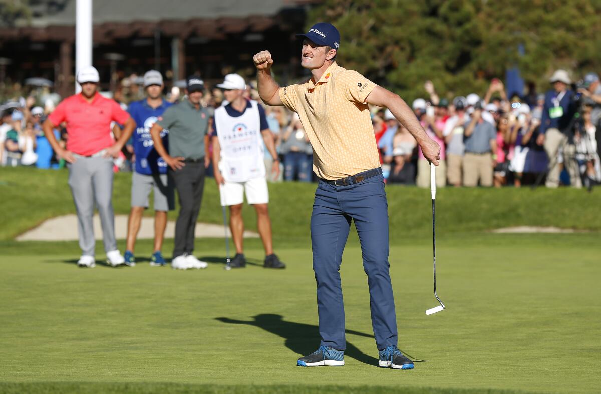 Justin Rose celebrates after a birdie on the 18th hole to win the Farmers Insurance Open at Torrey Pines on Jan. 27, 2019.