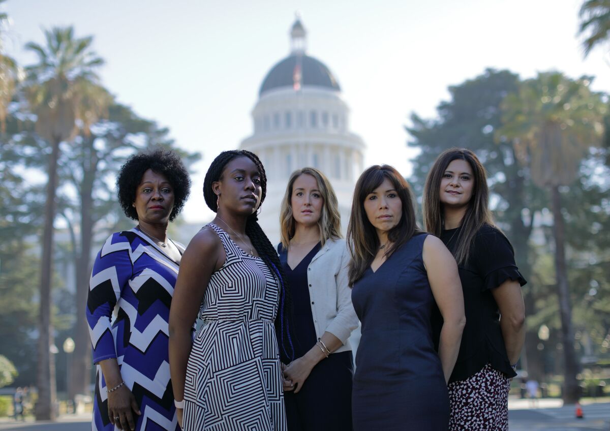 Tina McKinnor, left, Sadalia King, Amy Thoma Tan, Jodi Hicks and Sabrina Lockhart have shared their experiences with sexual harassment in California's Capitol. (Myung Chun / Los Angeles Times)