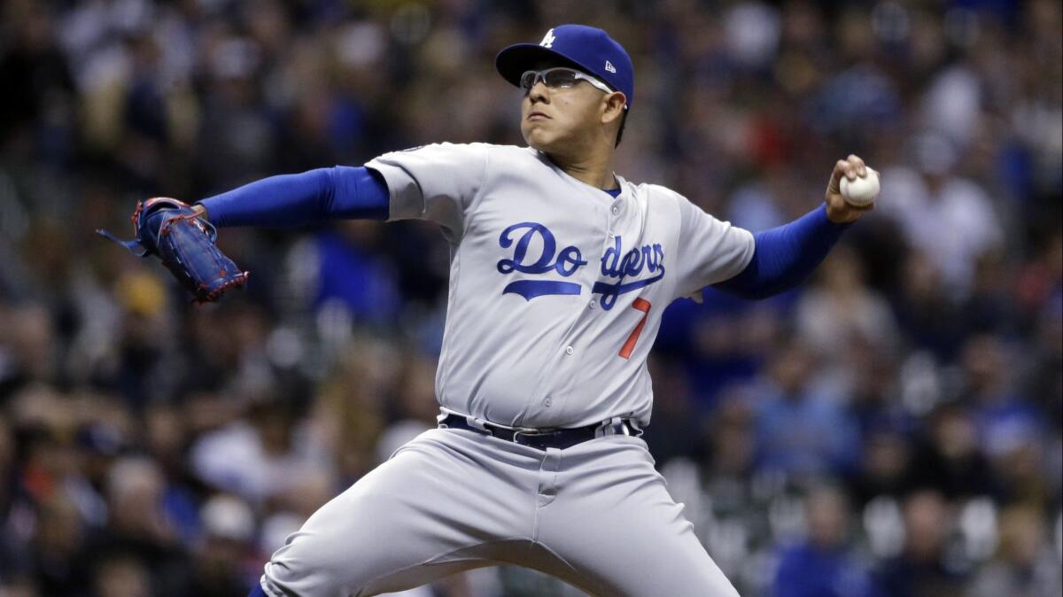 Dodgers' Julio Urias pitches during the first inning against the Milwaukee Brewers.