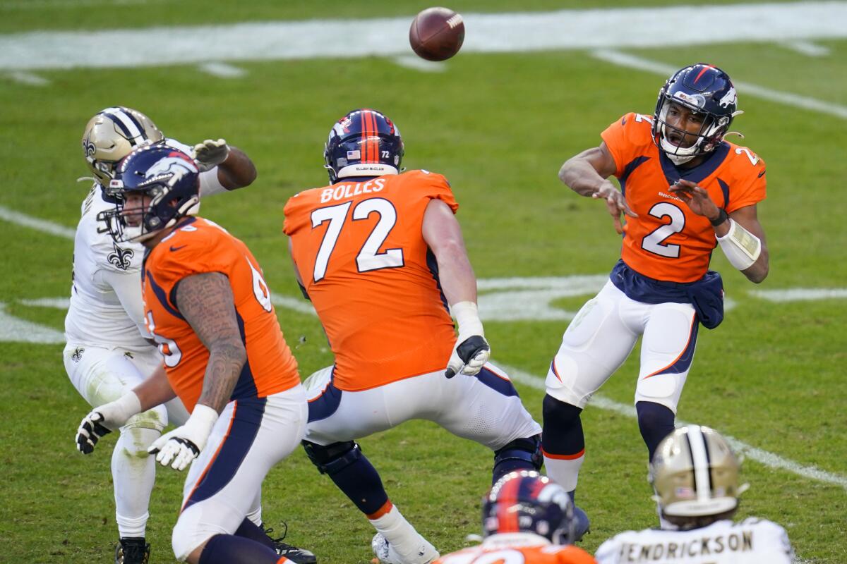 Denver Broncos quarterback Kendall Hinton throws against the New Orleans Saints.