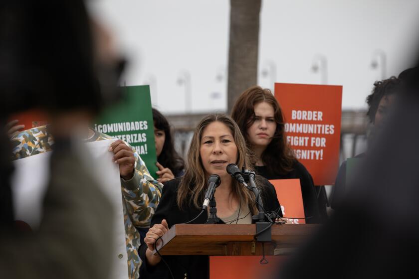 Imperial Beach , California - May 28: Maria Puga, whose husband was killed by Border Patrol agents, speaks during an event held by the Southern Border Communities Coalition that spoke out against border policies and actions of Border Patrol agents on Tuesday, May 28, 2024 in Imperial Beach , California. (Ana Ramirez / The San Diego Union-Tribune)